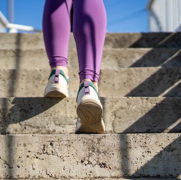 woman running on the city stairs.