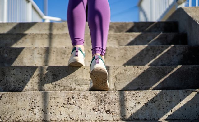 woman running on the city stairs.