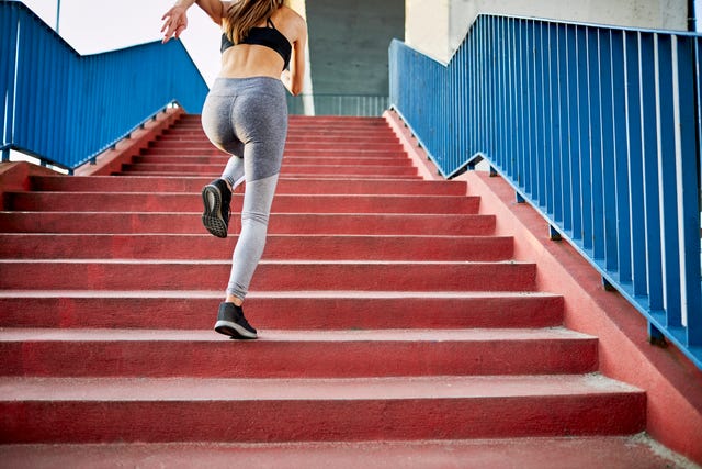 woman running upstairs