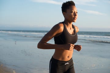 woman runs on the beach