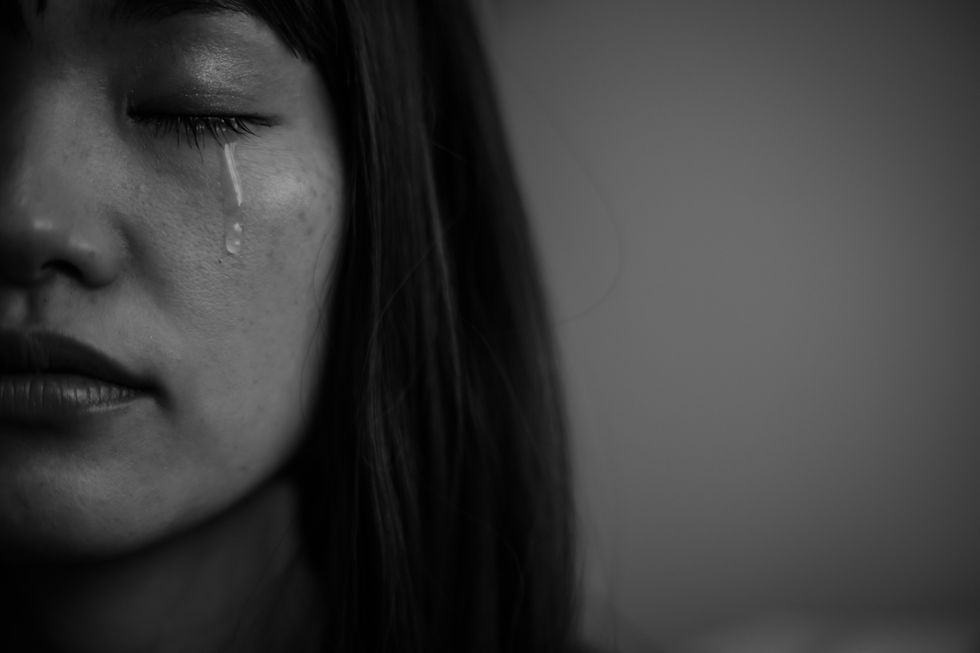 woman shedding tears