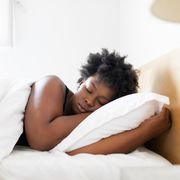 melatonin for sleep, woman sleeping in her bed at home