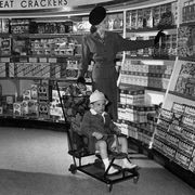 vintage photo of grocery store   woman shopping