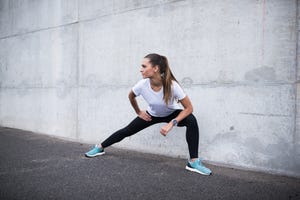 woman stretching outdoors