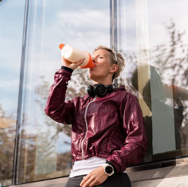 woman taking a break for a protein shake