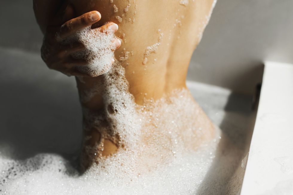 woman taking a bubble bath