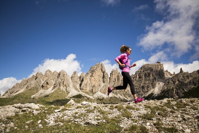 a woman trail running