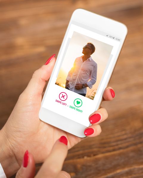 Woman using dating app and swiping user photos