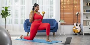 woman using exercise weights in a home