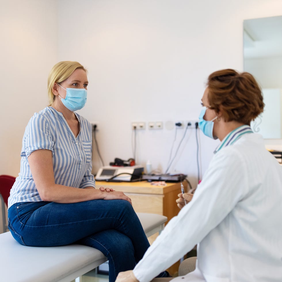 woman visiting doctor during pandemic