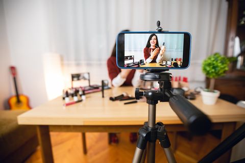 woman vlogging about makeup
