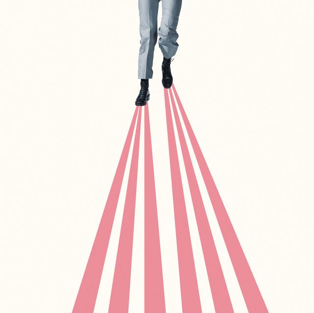 woman walking on pink parallel beams