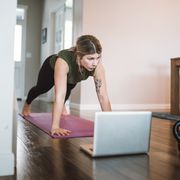 woman watching exercise tutorials online