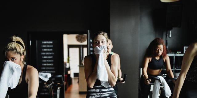 https://hips.hearstapps.com/hmg-prod/images/woman-wiping-sweat-from-face-with-towel-high-res-stock-photography-1574351644.jpg?crop=1.00xw:0.751xh;0,0.216xh&resize=640:*