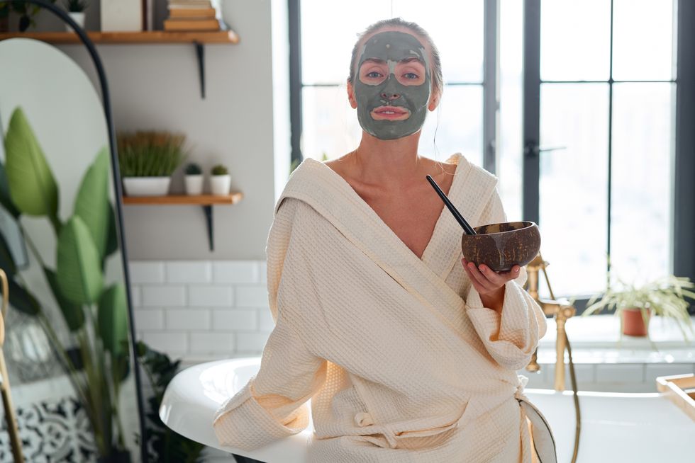 woman with exfoliating clay mask