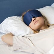 best eye mask woman with eye mask sleeping at home