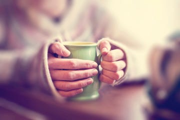woman with mug of tea