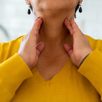 woman with thyroid gland problem
