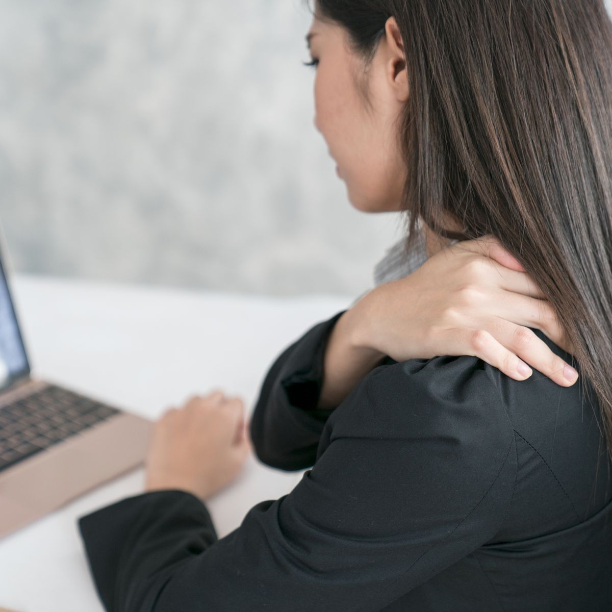 woman work hard shoulder pain