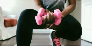 woman works out at home