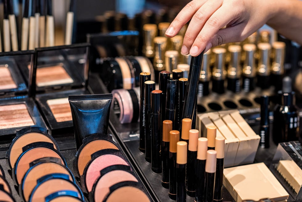 woman's hand choosing make up