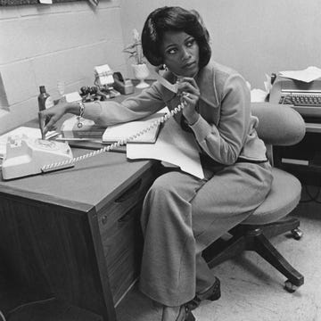 an african american office worker takes a phone call, usa, circa 1975 photo by fpgarchive photosgetty images