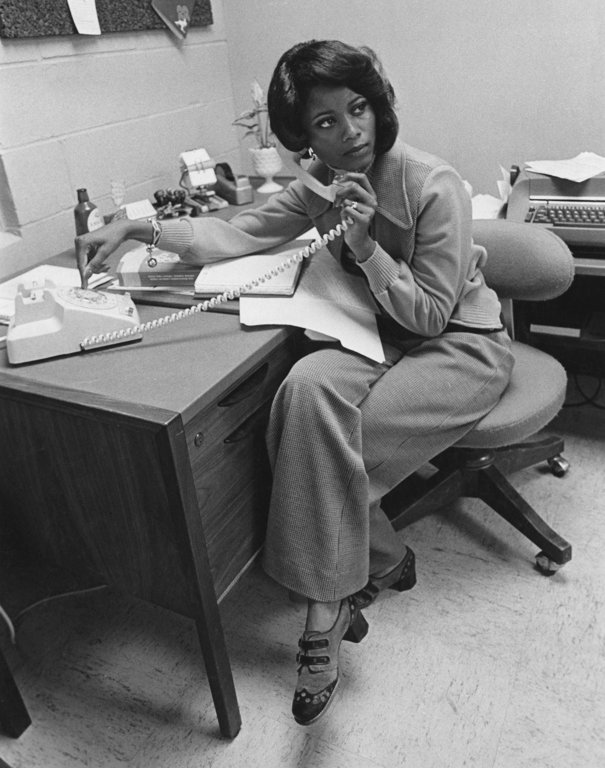 an african american office worker takes a phone call, usa, circa 1975 photo by fpgarchive photosgetty images