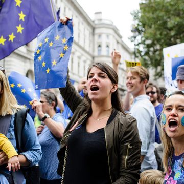 A group of women react to a group of pro-"Brexit"