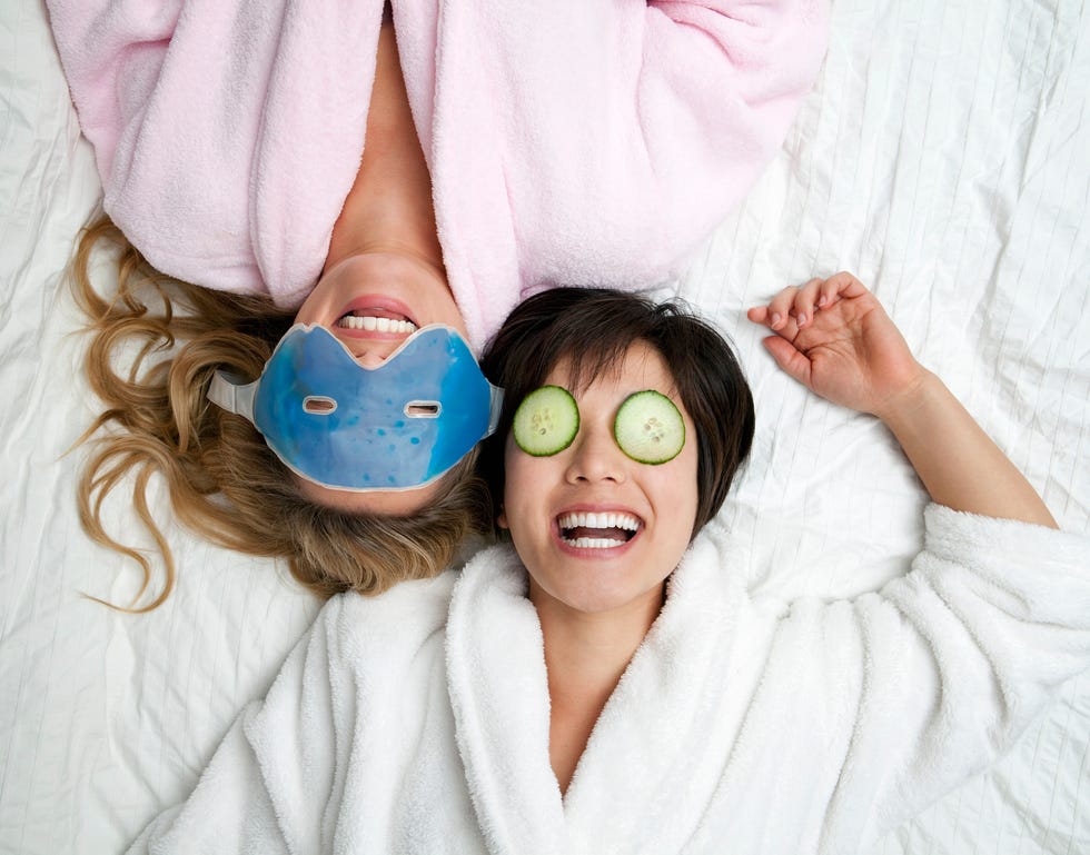 winter date ideas - Women in bathrobes wearing eye masks