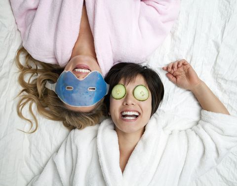 winter date ideas - Women in bathrobes wearing eye masks