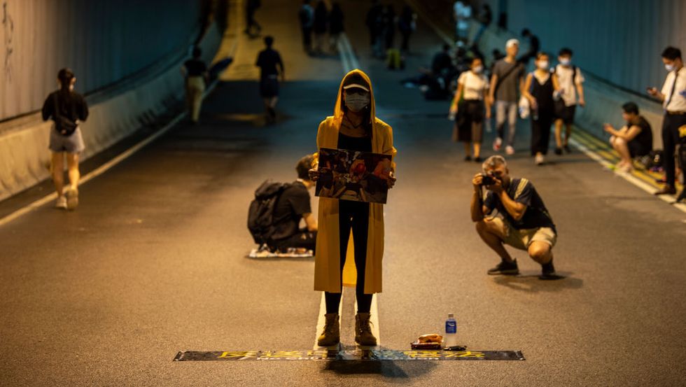 Hong Kong Protesters Surround Chief Executive Office