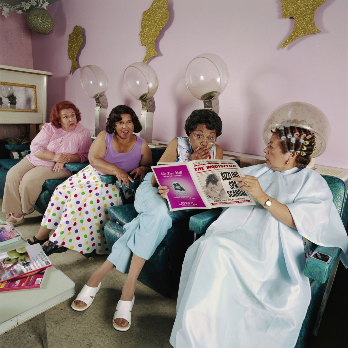 women reading magazine at salon