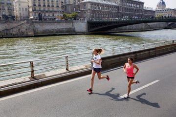 Women running in Paris along Seine