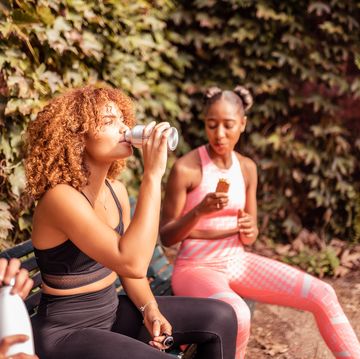 women sitting on the bench and refreshing after practice, top nutrition stories 2022