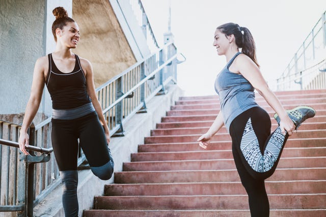 women stretching after run