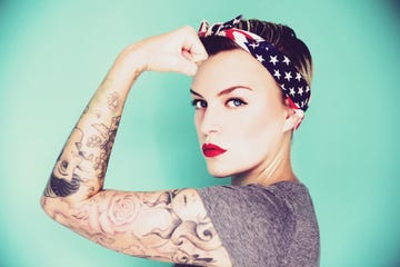 pin up woman with stars and stripes bandana curling bicep