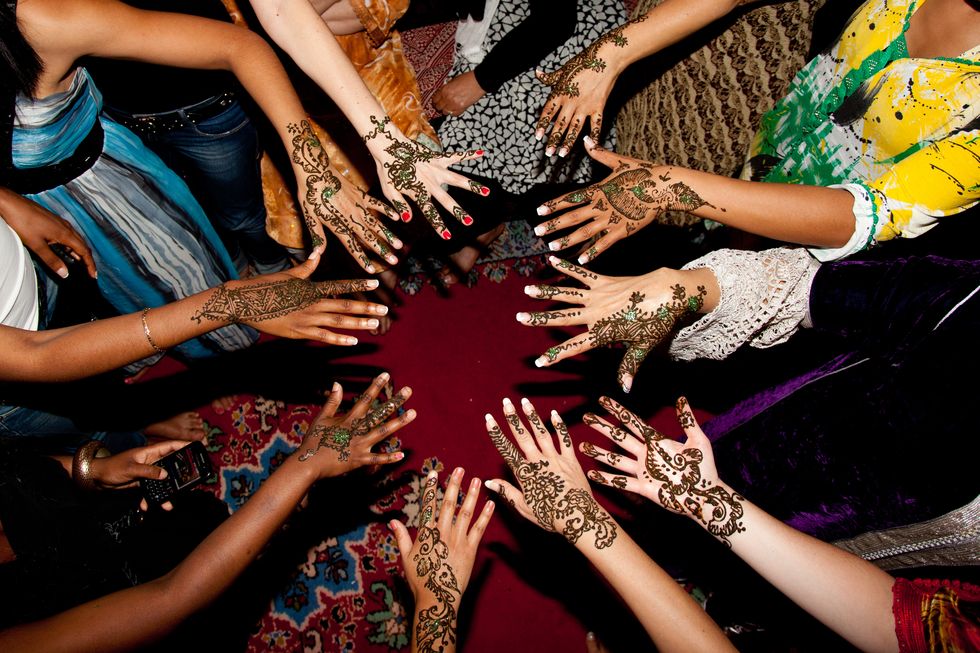 women hands henna decoration