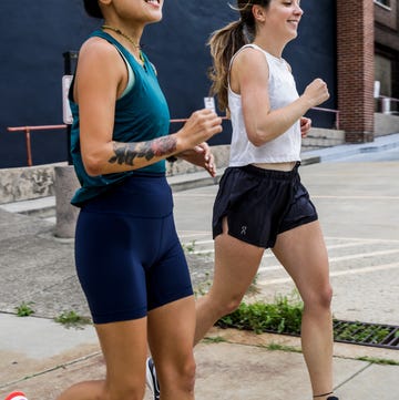 a pair of runners in high waisted bike shorts and loose running shorts a pair of runners in high waisted bike shorts and loose running shorts