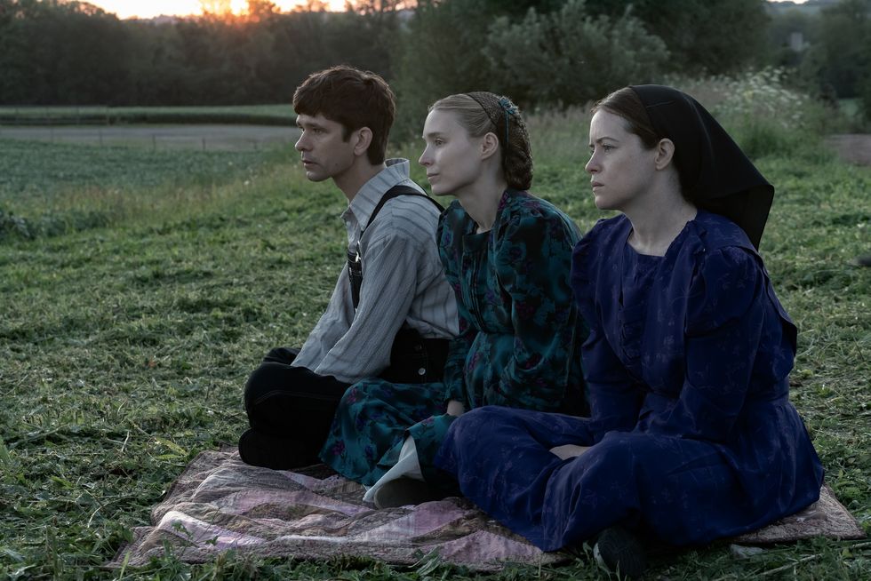 wt02993r4 l r ben whishaw stars as august, rooney mara as ona and claire foy as salome in director sarah polley’s film women talking an orion pictures release photo credit michael gibson © 2022 orion releasing llc all rights reserved