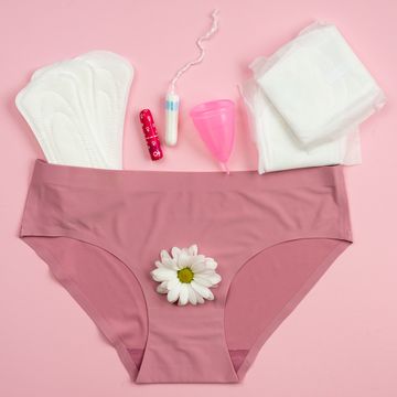 underwear a flower and sanitary towels placed around it