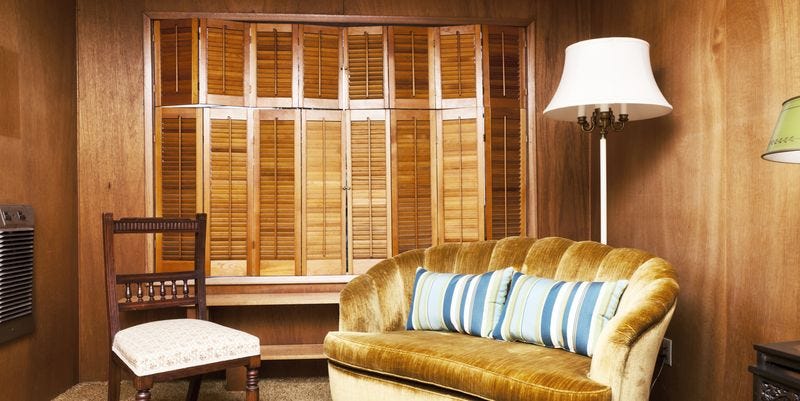 furniture, room, interior design, property, living room, table, lighting, wall, floor, couch,