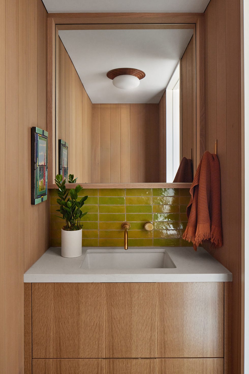 powder room with wood walls and vanity powder room with wood walls and vanity