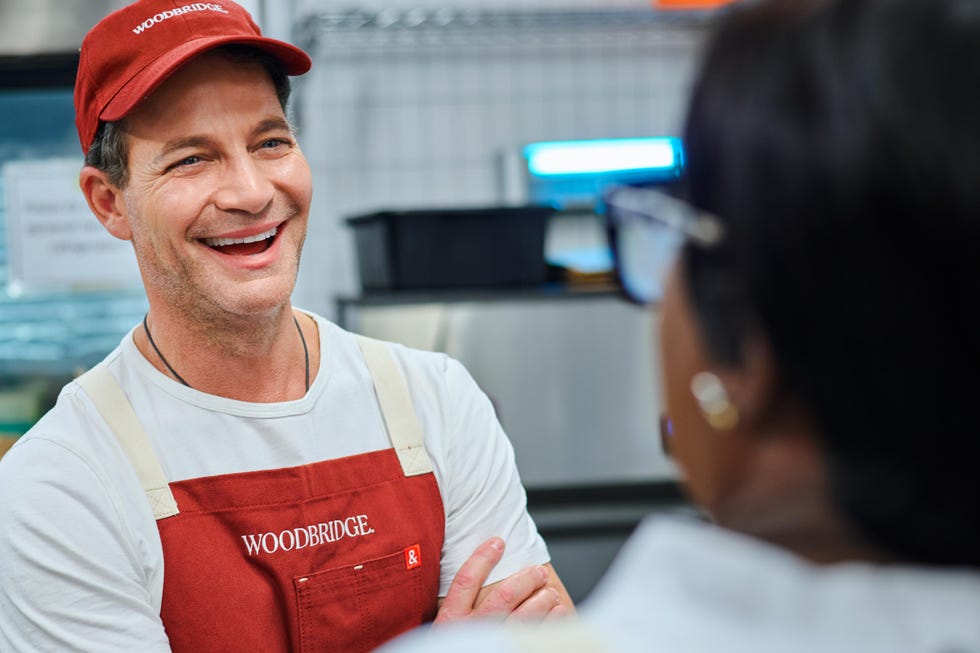 conversation between a staff member and a customer in a food service environment