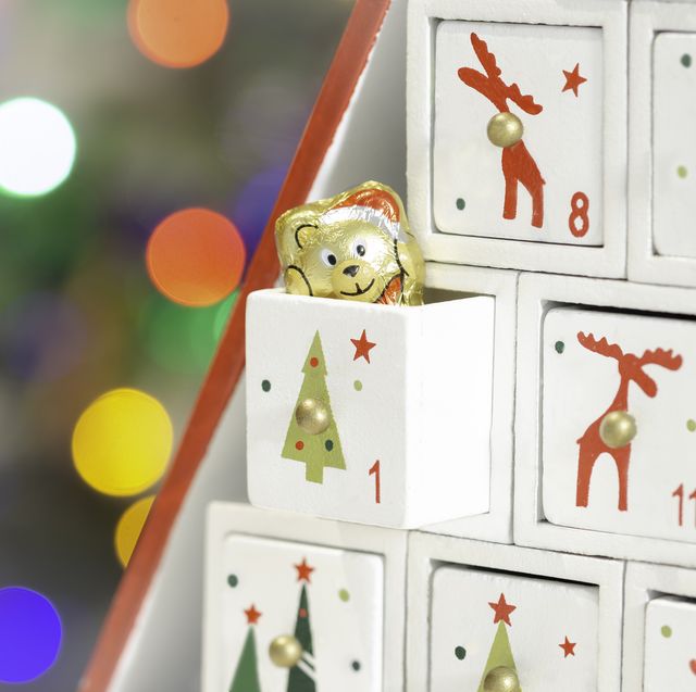 https://hips.hearstapps.com/hmg-prod/images/wooden-advent-calendar-christmas-tree-royalty-free-image-1669068690.jpg?crop=0.665xw:1.00xh;0.335xw,0&resize=640:*