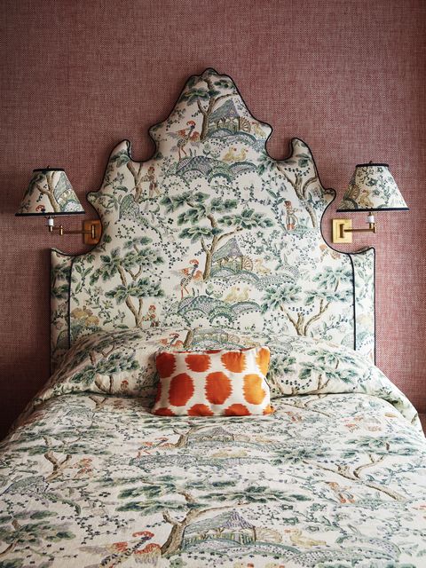 a warm basket weave wallpaper and archival english fabric in the guest room