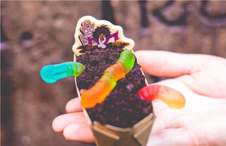Frozen dessert, Ice cream cone, Gummi candy, Finger, Hand, Food, Dessert, Sorbetes, Ice cream, Chocolate ice cream, 