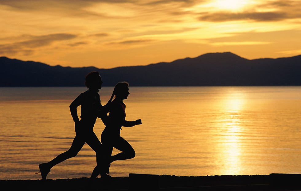 unworried runners in the sun