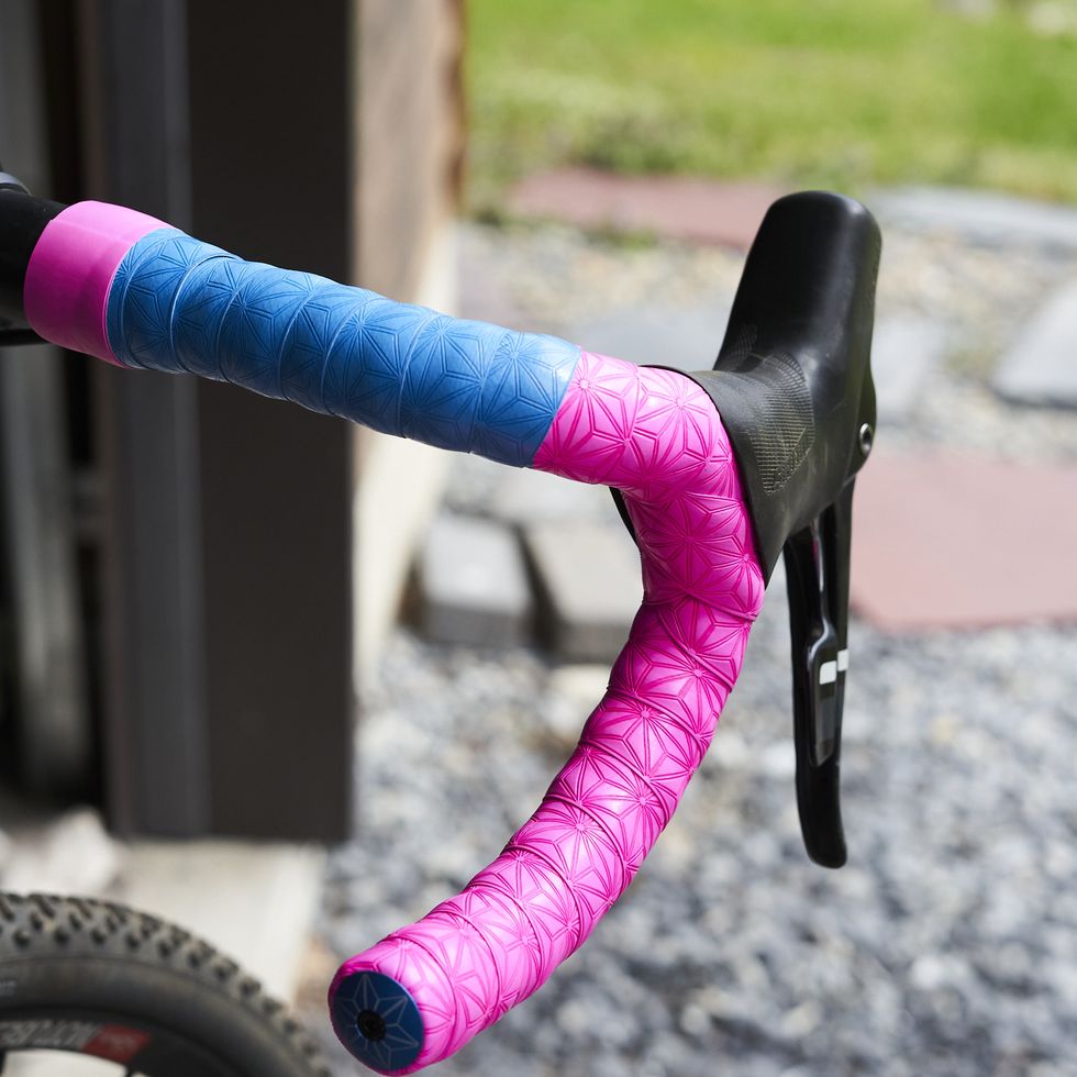 Bicycle, Bicycle wheel, Bicycle part, Bicycle tire, Bicycle handlebar, Pink, Vehicle, Tire, Bicycle frame, Bicycle fork, 
