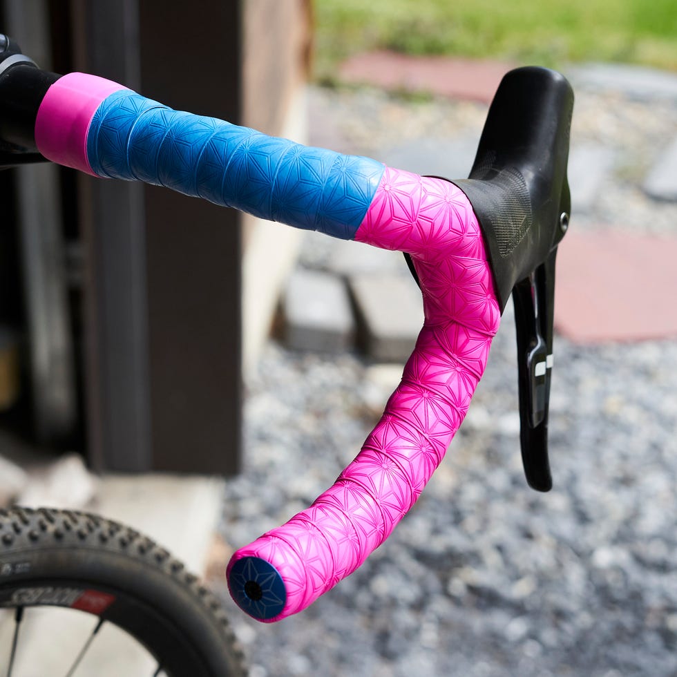 Bicycle, Bicycle wheel, Bicycle part, Bicycle tire, Bicycle handlebar, Pink, Vehicle, Tire, Bicycle frame, Bicycle fork, 