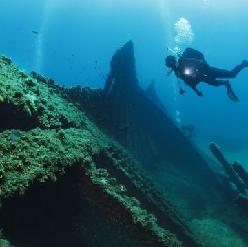 wreck diving over a shipwreck scuba diver point of view